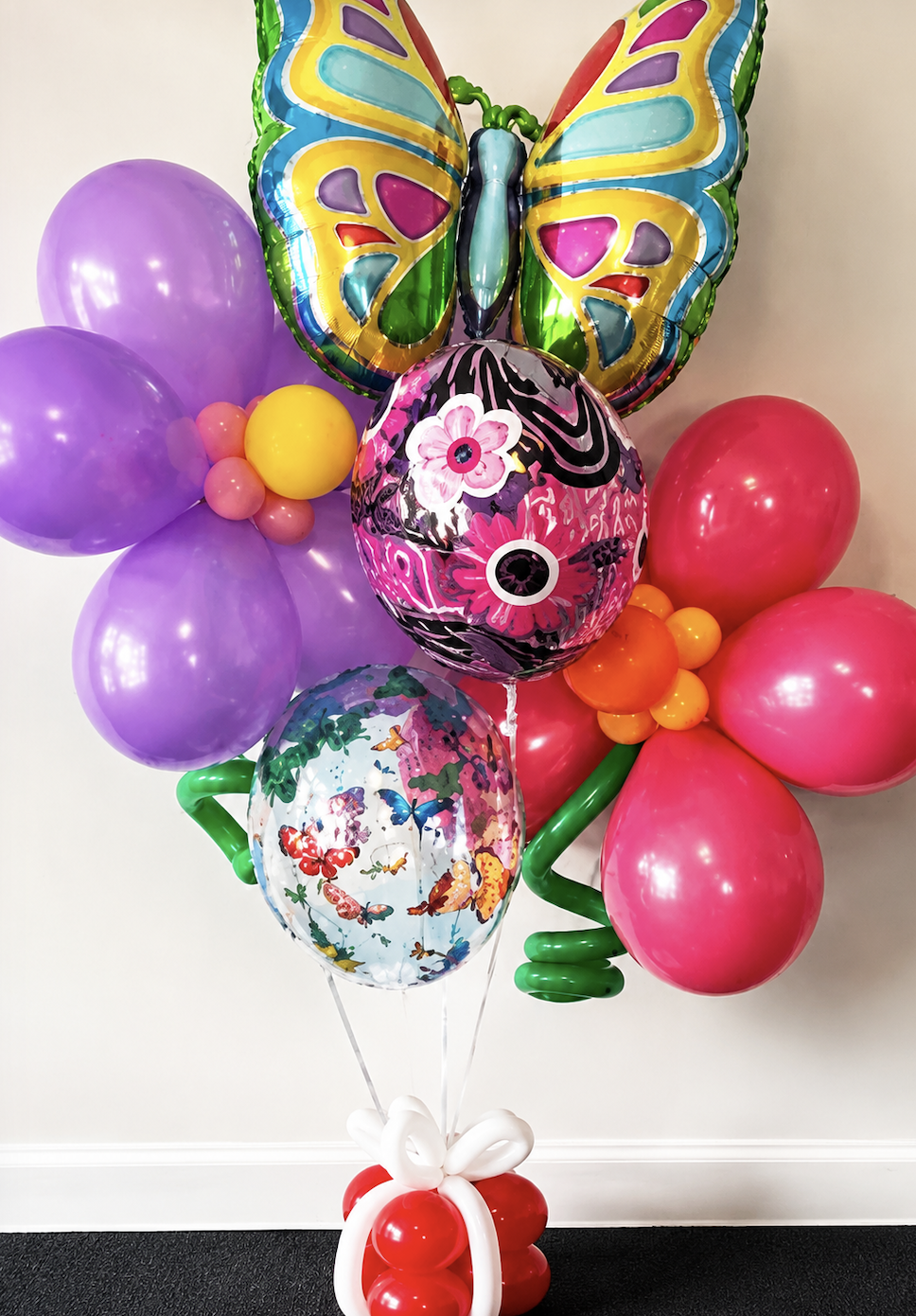 Butterfly Flower Balloon Bouquet delivered in Raleigh NC by Party Balloons by Q Butterfly Flower Balloon Bouquet delivered in Raleigh NC by Party Balloons by Q