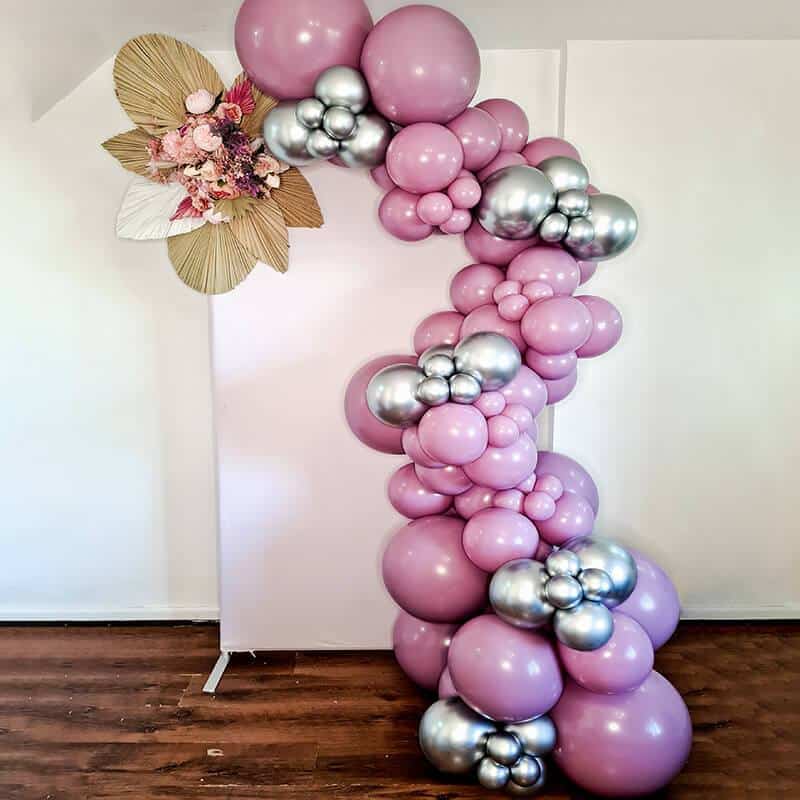 Balloon garland with White Chiara wall backdrop