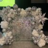 silver shimmer wall with balloon garland