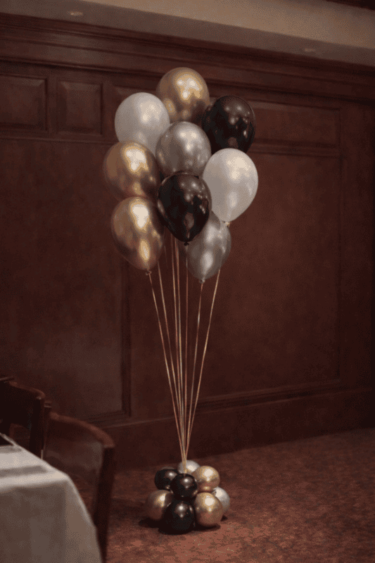 Gala helium balloon centerpiece of 9.