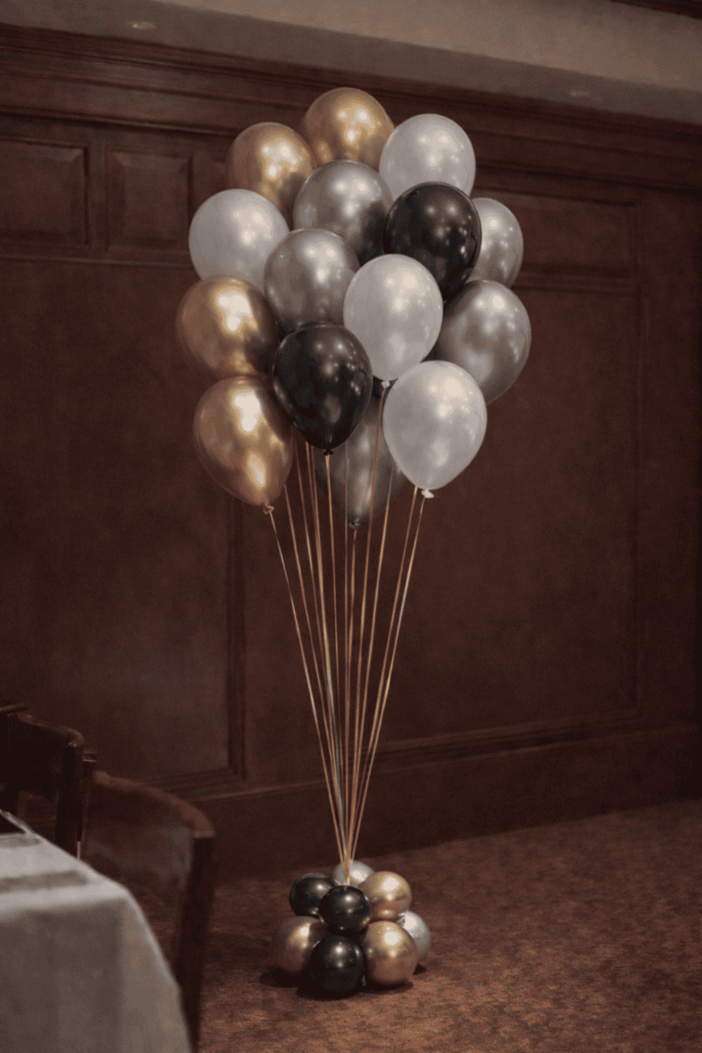 gala helium balloon centerpiece of 9-12 balloons