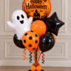 Mini Halloween balloon bouquet with ghost, black star, and orange polka-dot balloons