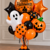 Spooky Halloween balloon bouquet with orange and black balloons, ghost, pumpkin, and stars
