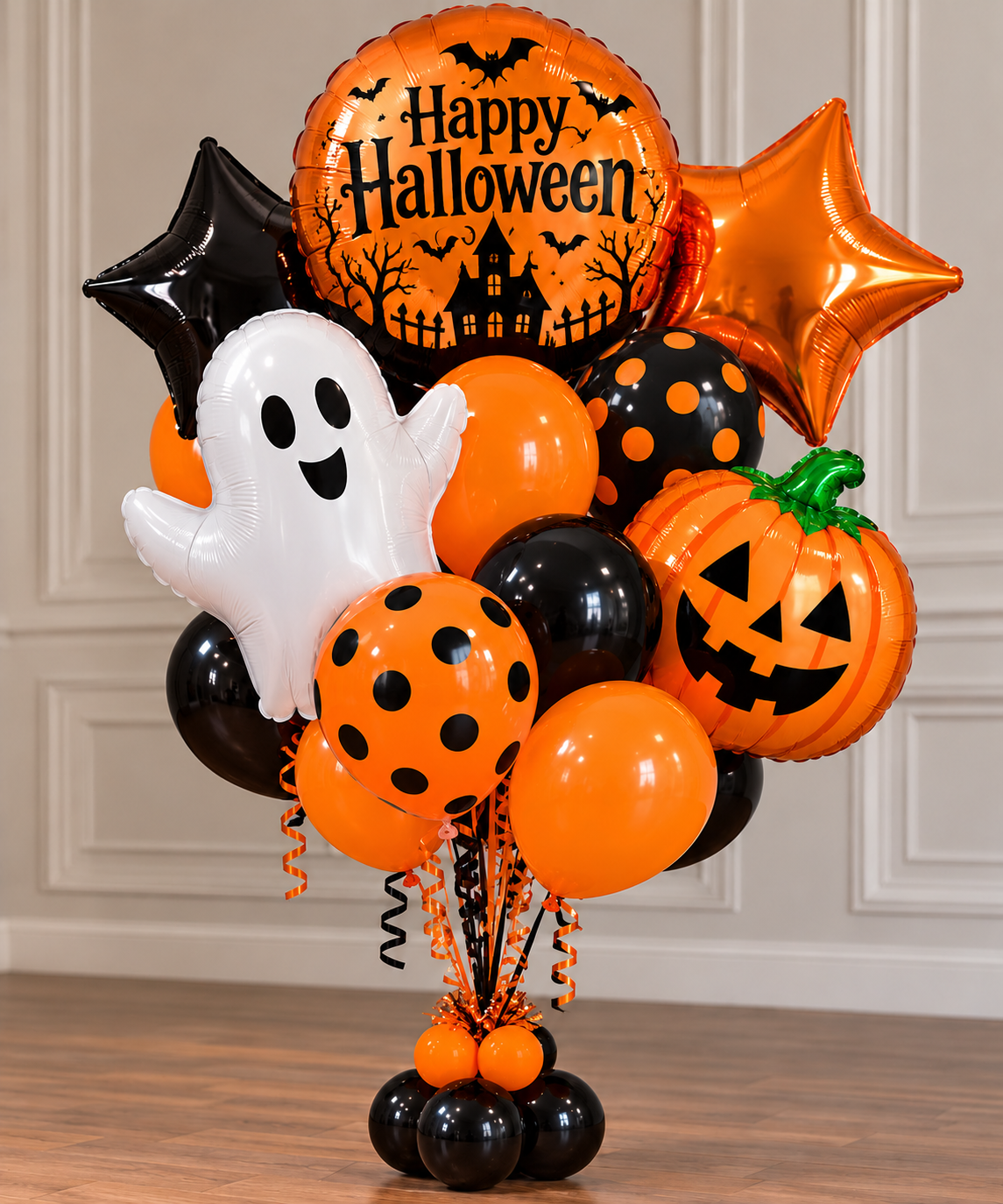 Spooky Halloween balloon bouquet with orange and black balloons, ghost, pumpkin, and stars